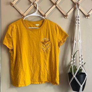 Chin up smiley face embroidered pocket tee